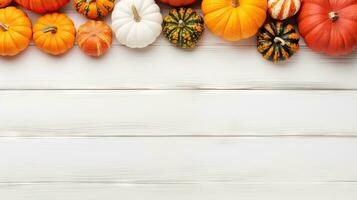 Autumn background with pumpkins on white wooden table. Top view with copy space Generative AI photo