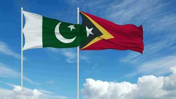 Pakistan en oosten- Timor vlaggen golvend samen in de lucht, naadloos lus in wind, 3d renderen video