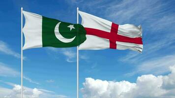 Pakistán y Inglaterra banderas ondulación juntos en el cielo, sin costura lazo en viento, 3d representación video