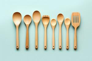 A simplistic modern kitchen utensil set isolated on a gradient background photo