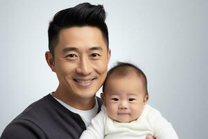 Ai generated studio portrait of handsome man holding infant baby in his hands on different colour background photo