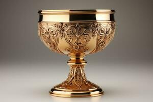 Golden chalice symbolizing the spirit of Midnight Mass isolated on a white background photo