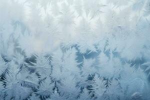 Close up of frost patterns on winter window background with empty space for text photo