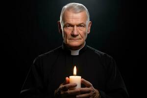 Priest holding Midnight Mass on Christmas Eve isolated on a gradient background photo