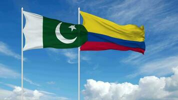 Pakistan en Colombia vlaggen golvend samen in de lucht, naadloos lus in wind, 3d renderen video