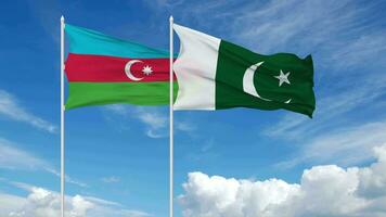 pakistan och azerbaijan flaggor vinka i de himmel, sömlös slinga i vind, 3d tolkning video