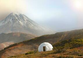 glamping on volcano in kamchatka peninsula in sun light photo