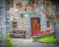Beautiful courtyard of old stone houses in France. Selective focus photo