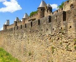 Medieval stone fortress wall view. France photo