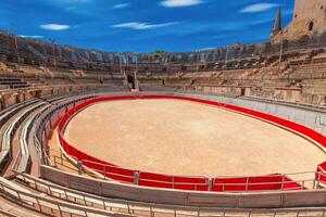 The Interior of the Colosseum or Coliseum in Arles, France photo