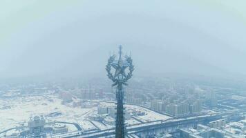 Frozen star of Moscow State University in winter. Aerial view. Flying around. video