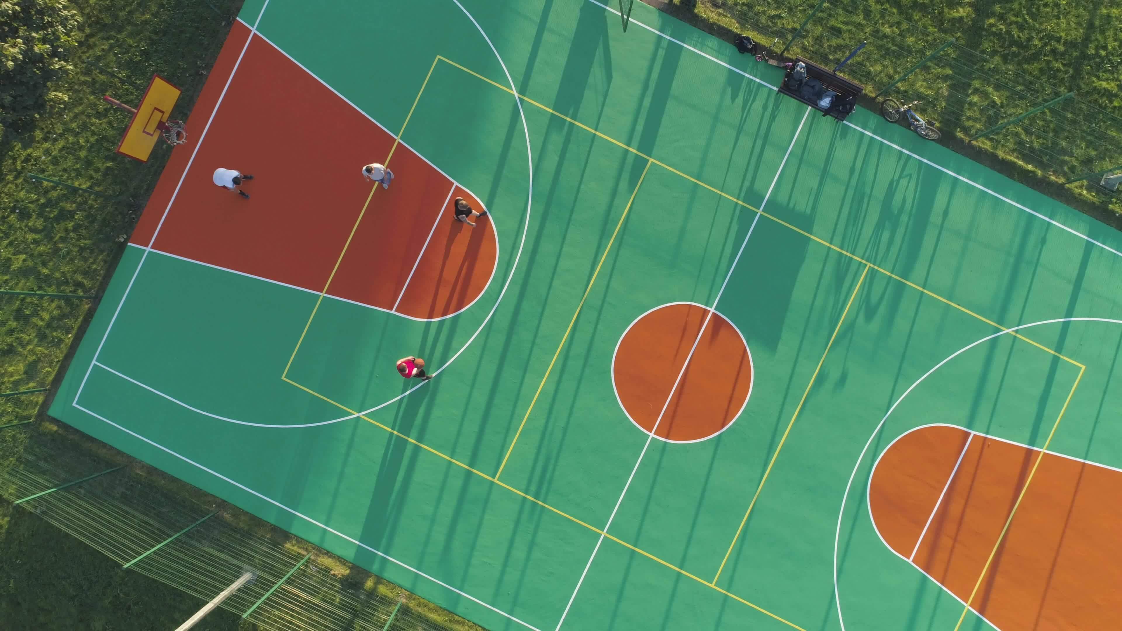 People Are Playing Basketball On Court Aerial Vertical Top View Drone basketball-team-roster-and-bench-wearing-sport-jersey-for-infographic