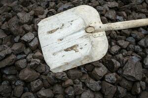 Shovel and coal, lignite storage photo