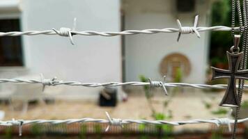 Religion Symbol Cross on Metallic Fence video