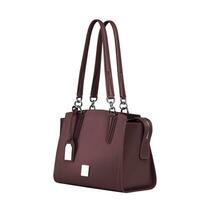 Practical dark burgundy handbag with two handles isolated on white photo