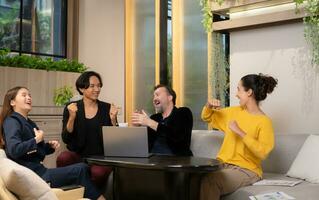 Group of business people discussing business plan at meeting table in office. photo