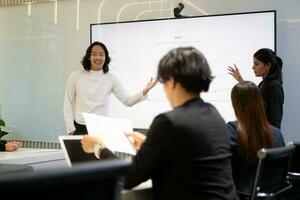 Business people having a meeting and present in a conference room at the office. Business meeting concept. photo