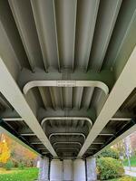 Bottom view of the pedestrian bridge in a park photo