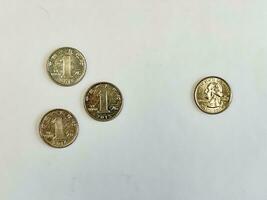 US quarter dollar coin vs three one yuan coins photo