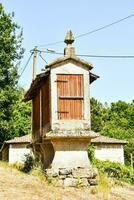 a small building with a wooden door photo