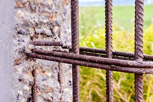 a rusty iron fence photo