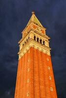 the clock tower of the palazzo dei signori in venice photo