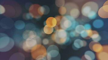Abstract bokeh background animation with gently flickering defocused warm blue and amber light spheres. This elegant motion background is full HD and a seamless loop. video