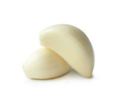 Peeled garlic cloves in stack isolated on white background with clipping path photo