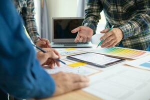 The designer team is designing the uxui system to make the uxui system work well on new phones and support system updates. Website development concept UI UX front end designer photo