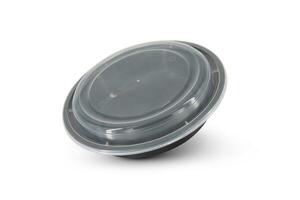 A black rounded food tray isolated on white background photo