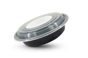 Black plastic food containers with transparent lid and white cardboard label photo