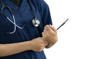 female doctor in dark blue uniform holds clipboard with the patient's information in her hand and the female doctor also has stethoscope around her neck in preparation for medical examination. photo