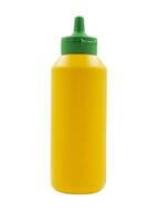 yellow squeeze plastic bottle for mustard isolated on white background photo