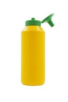 yellow squeeze plastic bottle for mustard isolated on white background photo