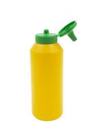amarillo exprimir el plastico botella para mostaza aislado en blanco antecedentes foto