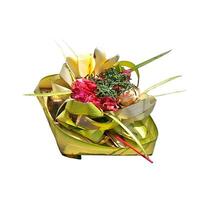 Canang sari Balinese Offerings in white background photo