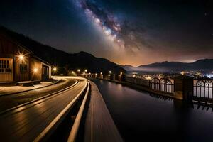 un tren yendo mediante el noche cielo con el lechoso terminado el montañas. generado por ai foto