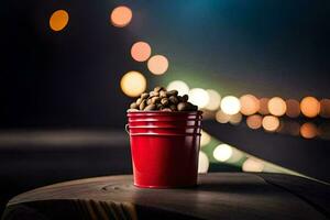 a red bucket with peanuts on a table in front of a blurry background. AI-Generated photo