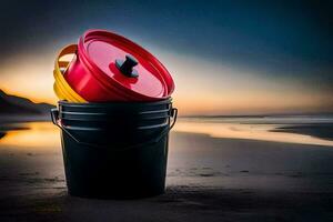 a bucket with a red lid and yellow lid sitting on the beach. AI-Generated photo