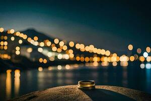 a wedding ring sits on a rock in front of a city at night. AI-Generated photo