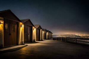 a row of wooden huts on the beach at night. AI-Generated photo