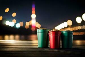 two cups of popcorn sitting on a wooden table with a city skyline in the background. AI-Generated photo