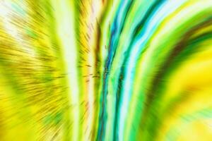 Blurred multicolored colorful background with flying stripes. Bright abstraction. photo