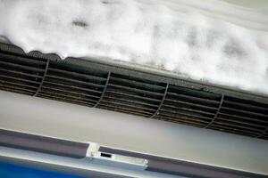 air conditioner cleaning with spray foam cleaner photo