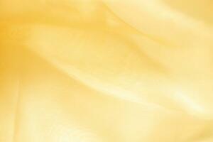 Abstract luxury gold fabric texture background photo