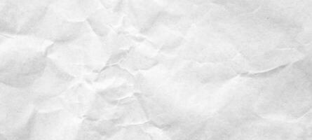 Abstract white crumpled and creased recycle craft paper texture background photo