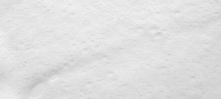 Abstract white soap foam bubbles texture background photo