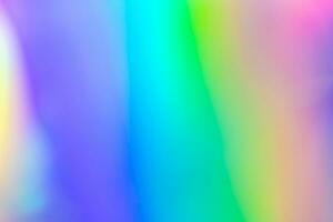 Abstract blur holographic rainbow foil iridescent background photo