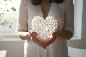 a woman holding a white heart shaped bokeh style background with Generative AI photo