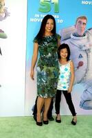 MingNa  children arriving at the Planet 41 Movie Premiere Manns Village Theater  Westwood Los Angeles CA November 14 2009 photo